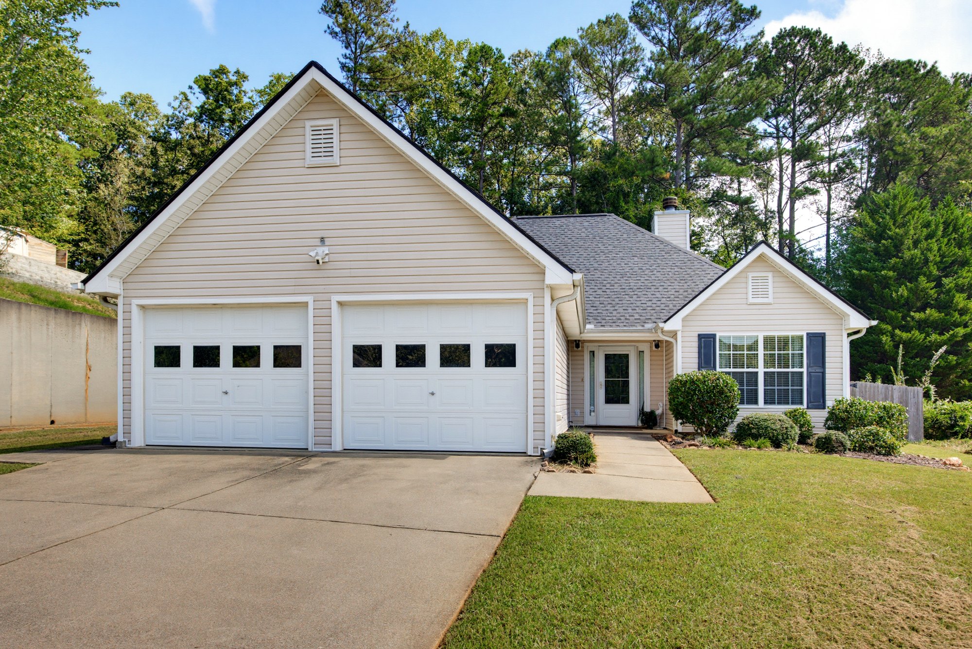Front exterior of 123 O’Connor Drive with a two-car garage